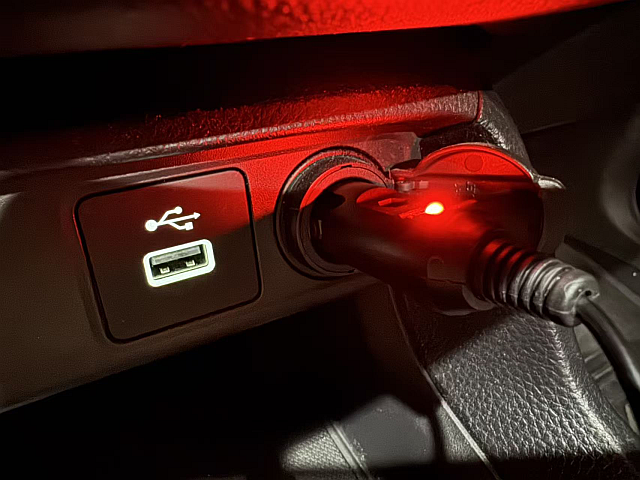 BettaSign power cable connected to a car power source